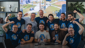 a team of game developers enjoying their game’s success