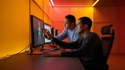 Animators working on 3D animation rendering