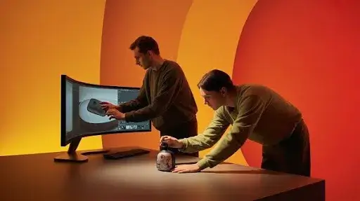 Animators working on 3D rendering of a product