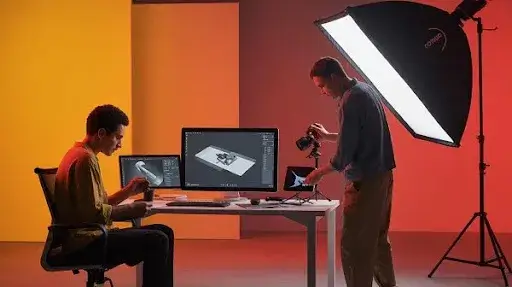 Professionals working on 3D rendering and product photography